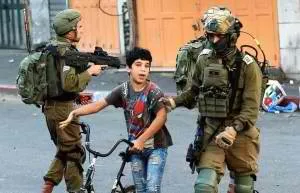 soldiers escorting Palestinianchild
