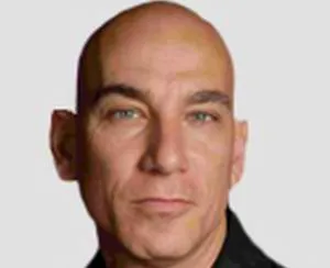 "Yes, I am a dickhead, and yes, the term refers to both my attitude and my appearance."